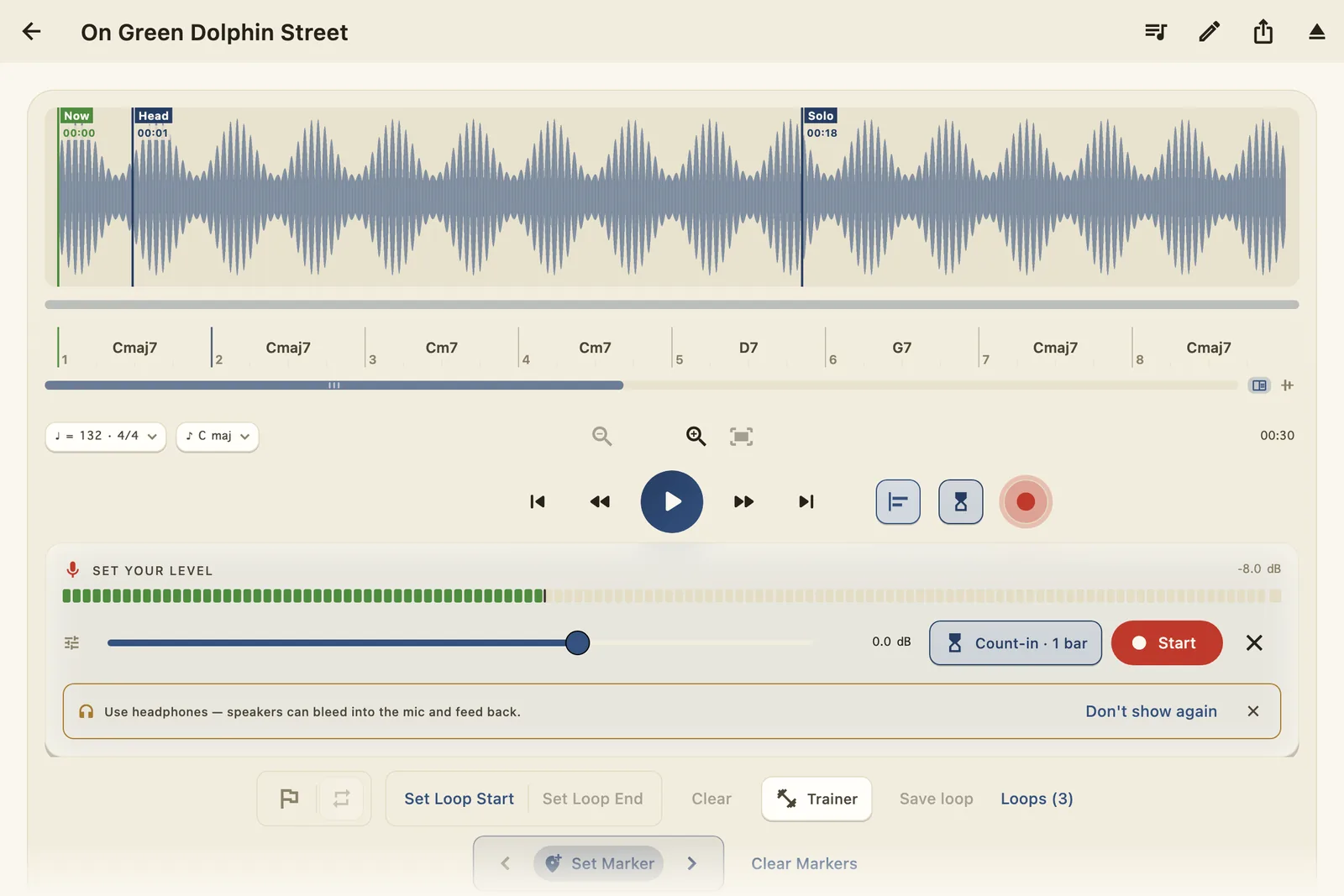 The record arm tray open on the Player: a live green level meter reading −8 dB with peak hold, the capture gain slider, a Count-in one bar chip, and the red Start button — with a use-headphones advisory beneath.