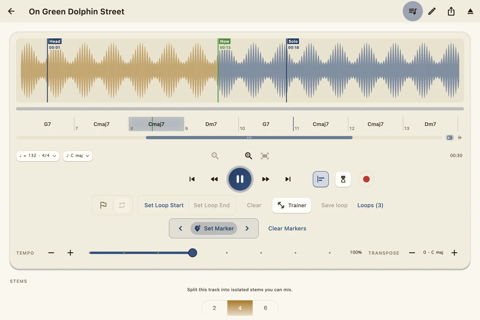 WoodShed Player in the Sheet Music theme: a gold and slate waveform mid-playback with named section markers Head and Solo, a bar-numbered chord lane underneath, and the full transport.