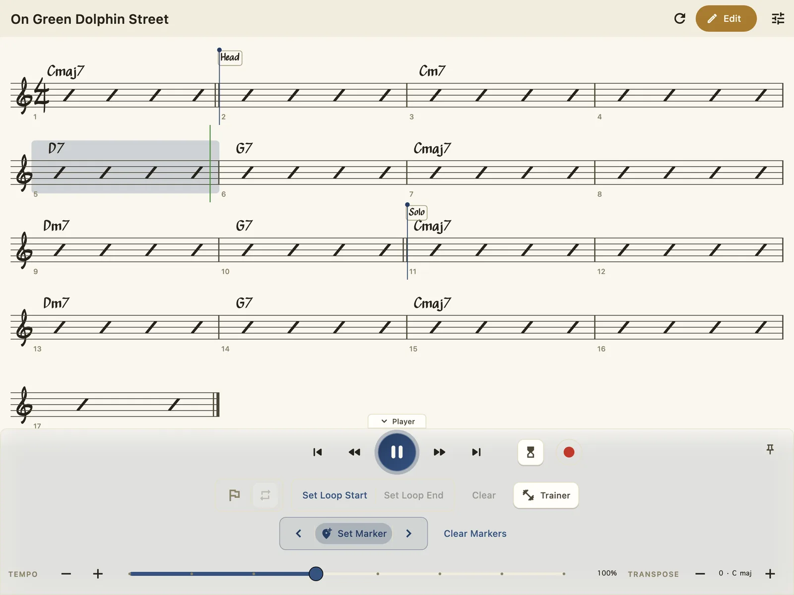The Staff View mid-playback: a jazz-engraved chart with rhythm slashes, the current bar highlighted, the beat cursor inside it, and Head and Solo markers pinned to the staff.